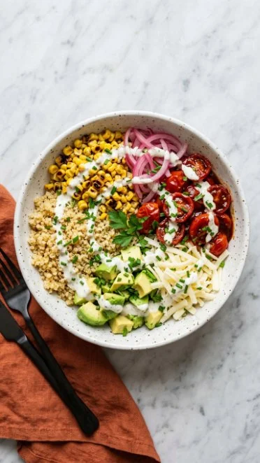 BBQ Ranch Chickpea Quinoa Bowls garnished with fresh ingredients