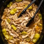 Delicious Mississippi Chicken dish served with creamy sauce and herbs