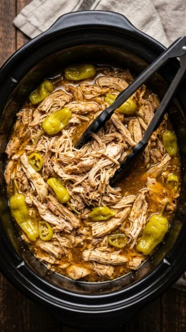 Delicious Mississippi Chicken dish served with creamy sauce and herbs