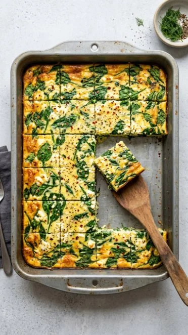 Delicious spinach and feta breakfast sandwich on a plate
