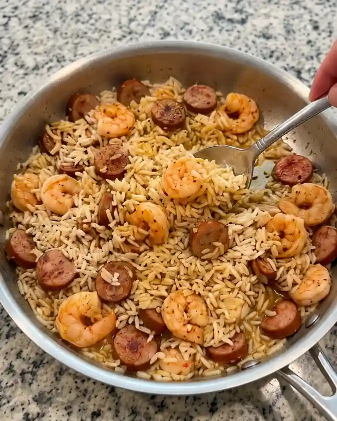 Cajun Garlic Butter Shrimp and Turkey Sausage Rice Skillet- in skillet