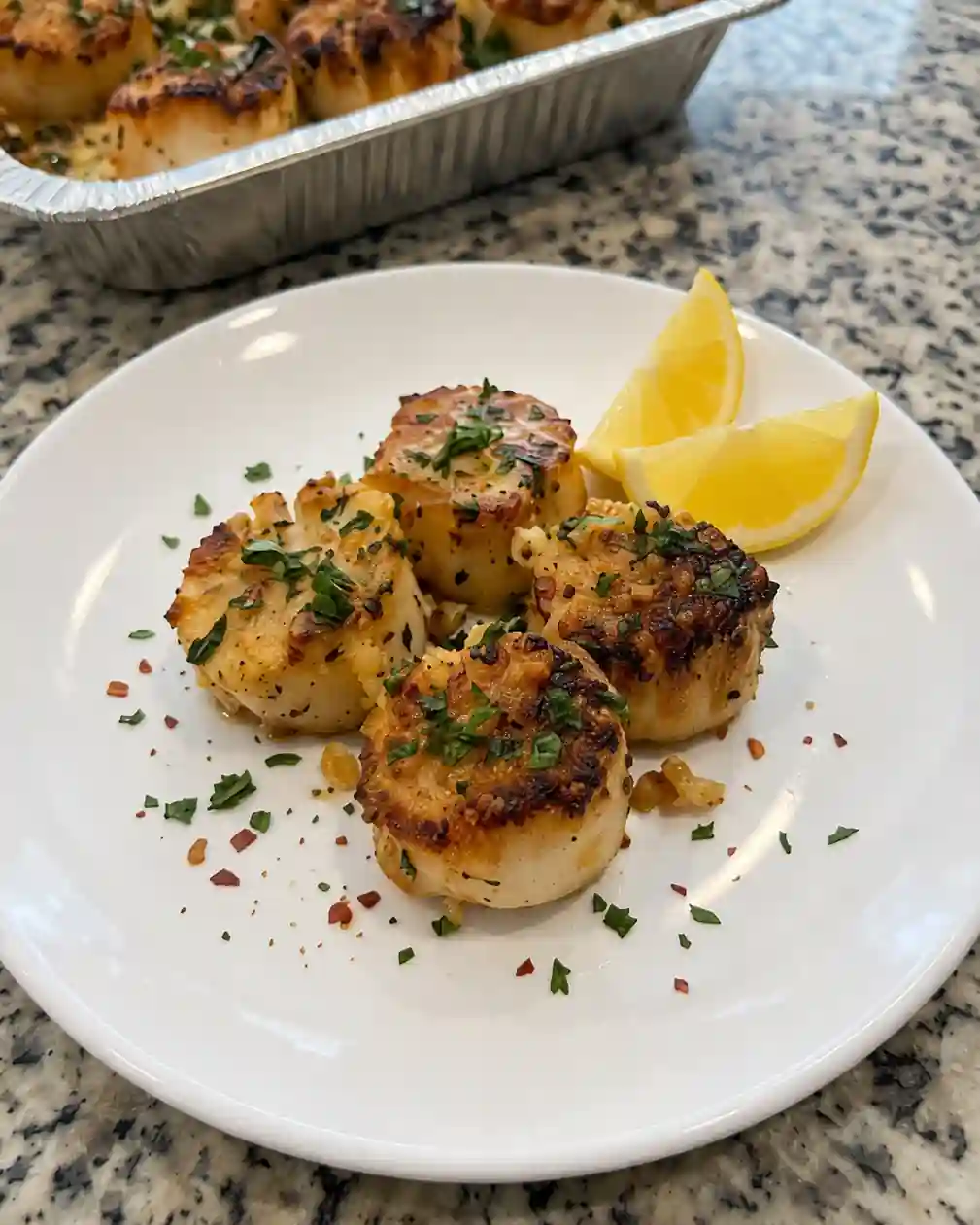 Garlic Butter Seared Scallops in plate