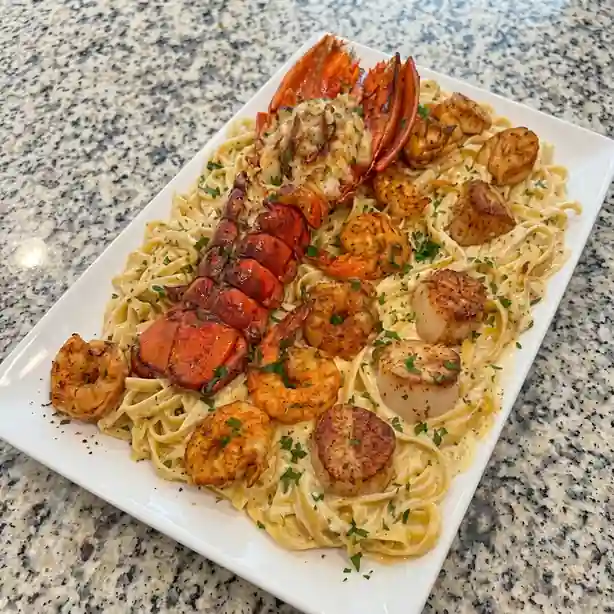 Creamy Cajun Lobster, Shrimp & Scallop Fettuccine