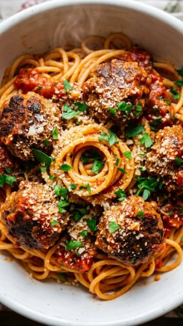 Instant Pot frozen meatball meal served in a bowl with sauce and herbs